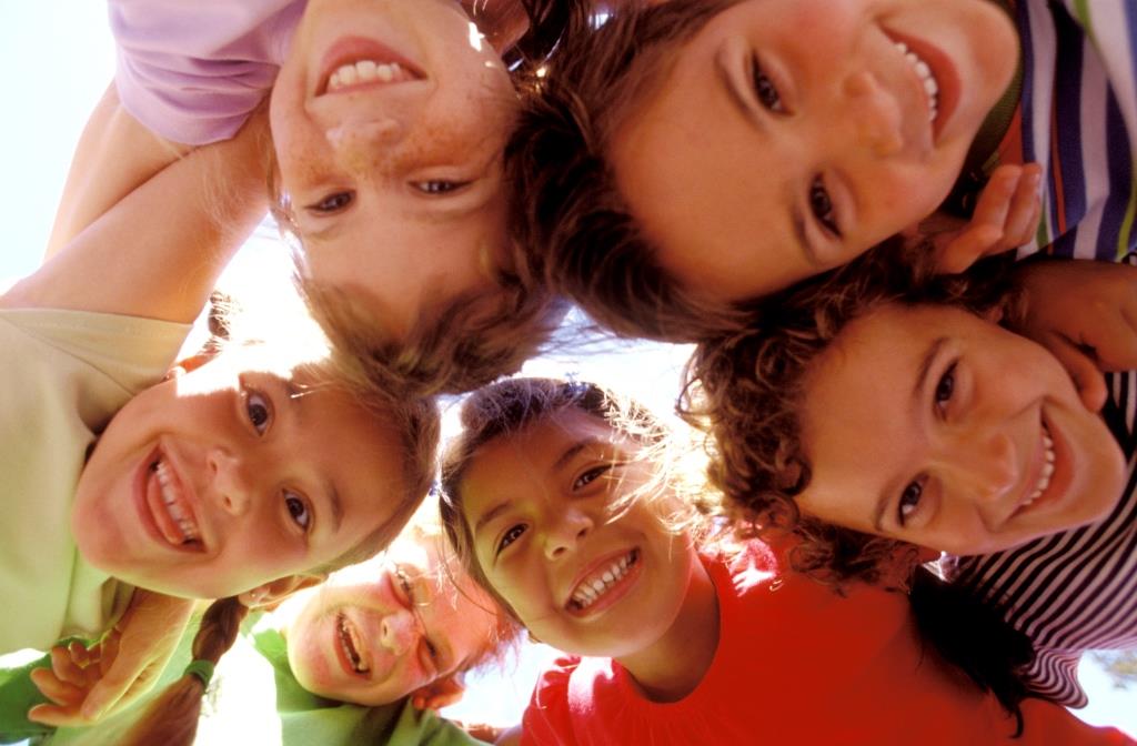 group_of_children_looking_down