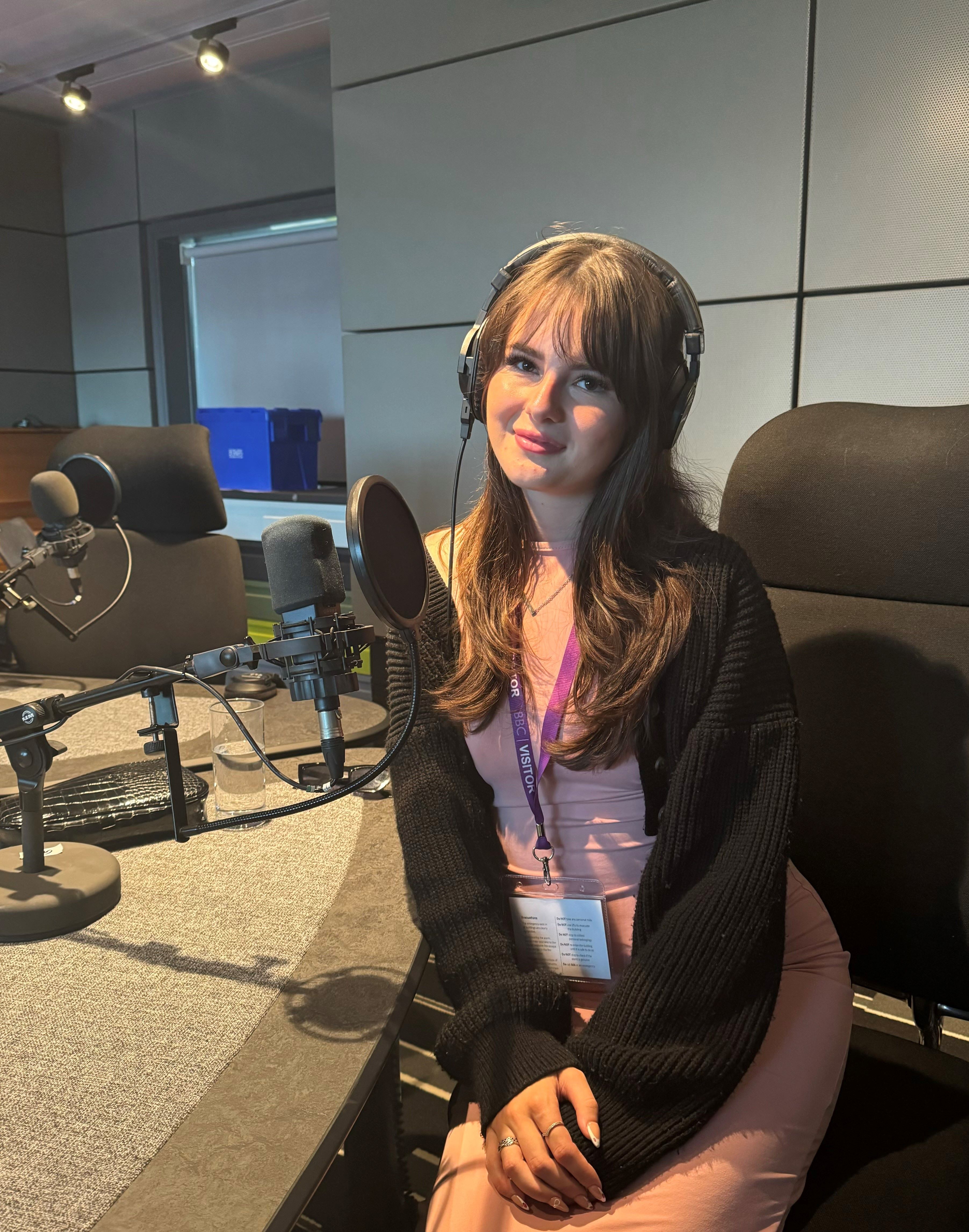 Jessica-Rae is in a radio broadcast studio at the BBC. 